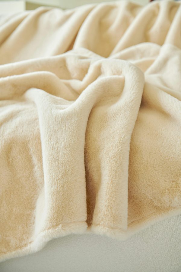 Couverture douillette avec doublure polaire : un incontournable pour les hivers rigoureux